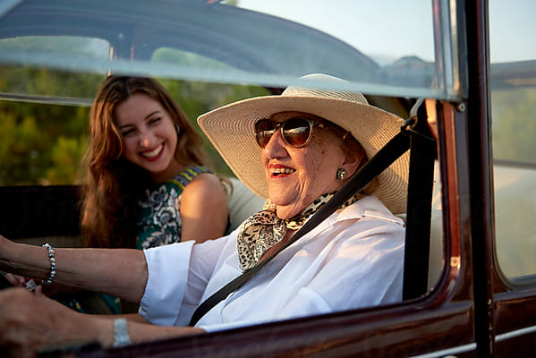 Grandma and granddaughter driving together
